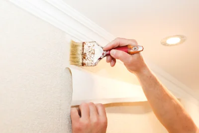 Pose de papier peint à Ancier — revêtements muraux et toiles de verre